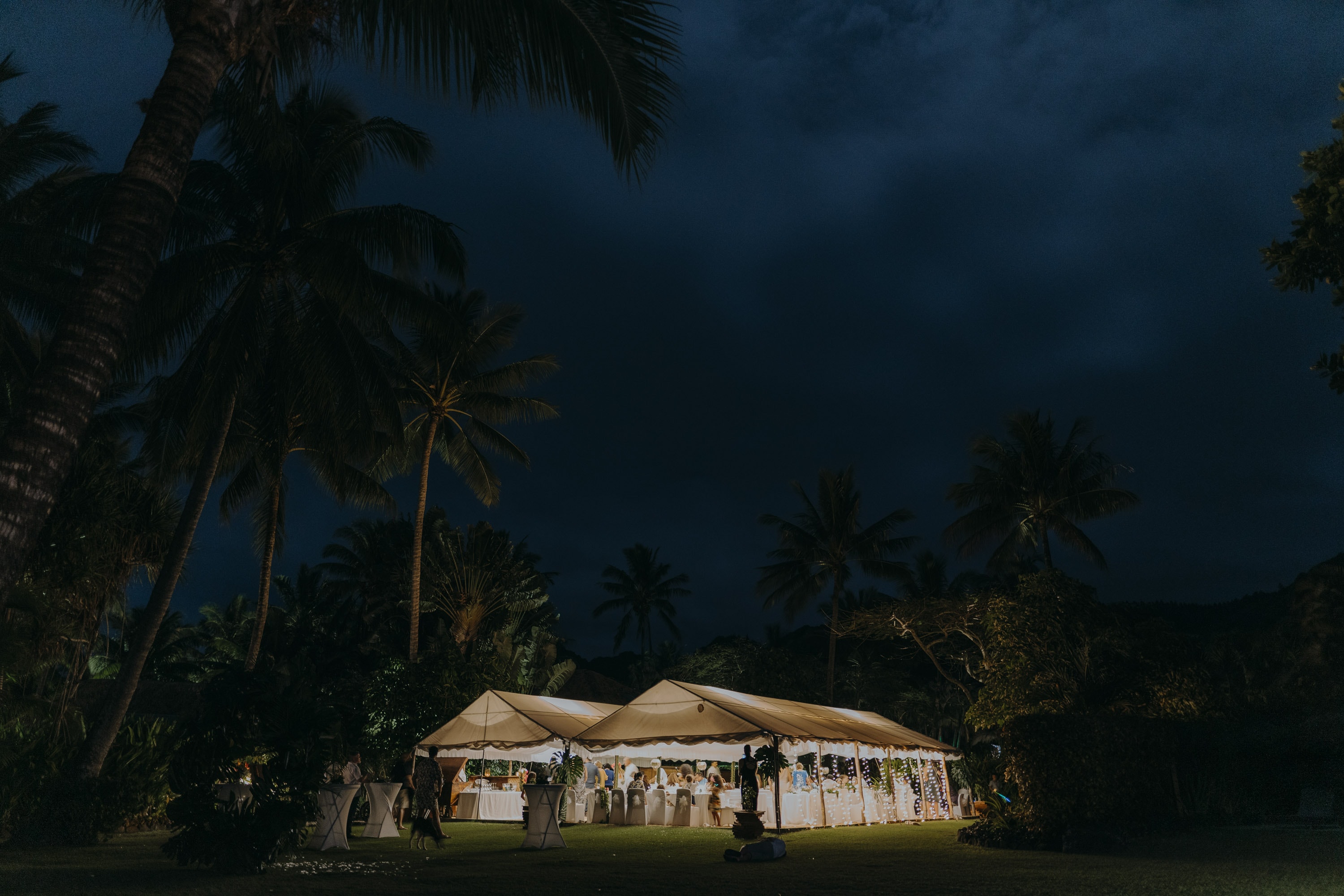 An beautiful wedding photo of the evenin setup of reception in Rarotonga