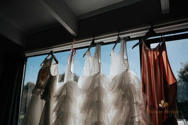 bridal dresses hanged up in Whanganui wedding photo